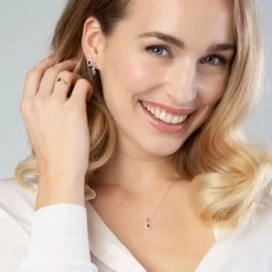 Voorkant -SieradenSpot Korting 14 karaat gouden ring ovaal met zirkonia 1