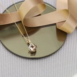 9 Karaat Tricolor Ketting Met Hanger Knoop -SieradenSpot Korting 9 karaat tricolor ketting met hanger knoop 2