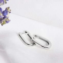 Zilveren Ovalen Oorringen Rhodiumplated -SieradenSpot Korting zilveren ovalen oorringen rhodiumplated 1